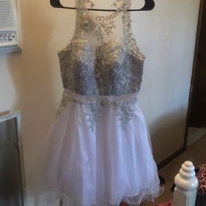 Im selling a white short prom dress.